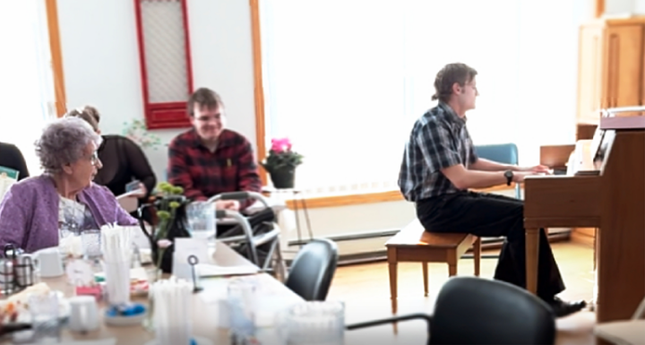 VCSU student Wyatt Landeis performs for Bridgeview residents